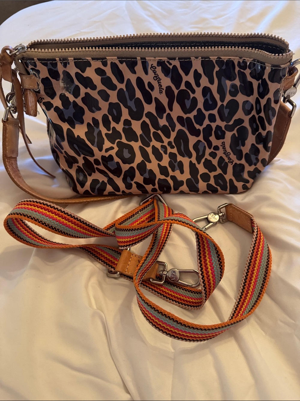 Consuela Brown and Black Leopard Crossbody with Multicolor Stripe Strap